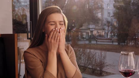 woman surprised in a cafe