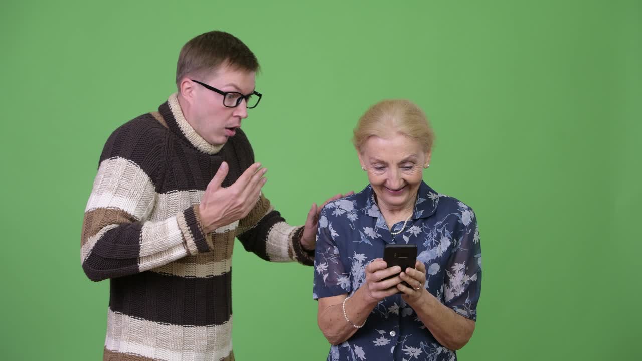 Grandmother getting caught by her grandson using phone