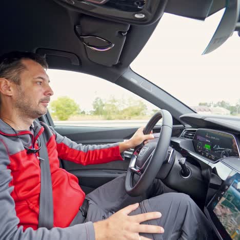 happy man driving vehicle