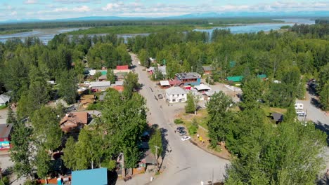 4k drone video of alaska railroad train and station at talkeetna, alaska during sunny summer day