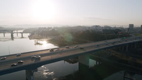 aerial footage flying towards the busy traffic on the williams memorial bridge on highway 27 in chattanooga, tn