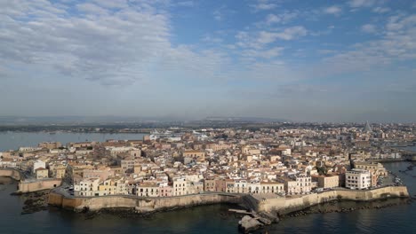 drone footage of syracuse is located in the southeast corner of the island of sicily, next to the gulf of syracuse beside the ionian sea