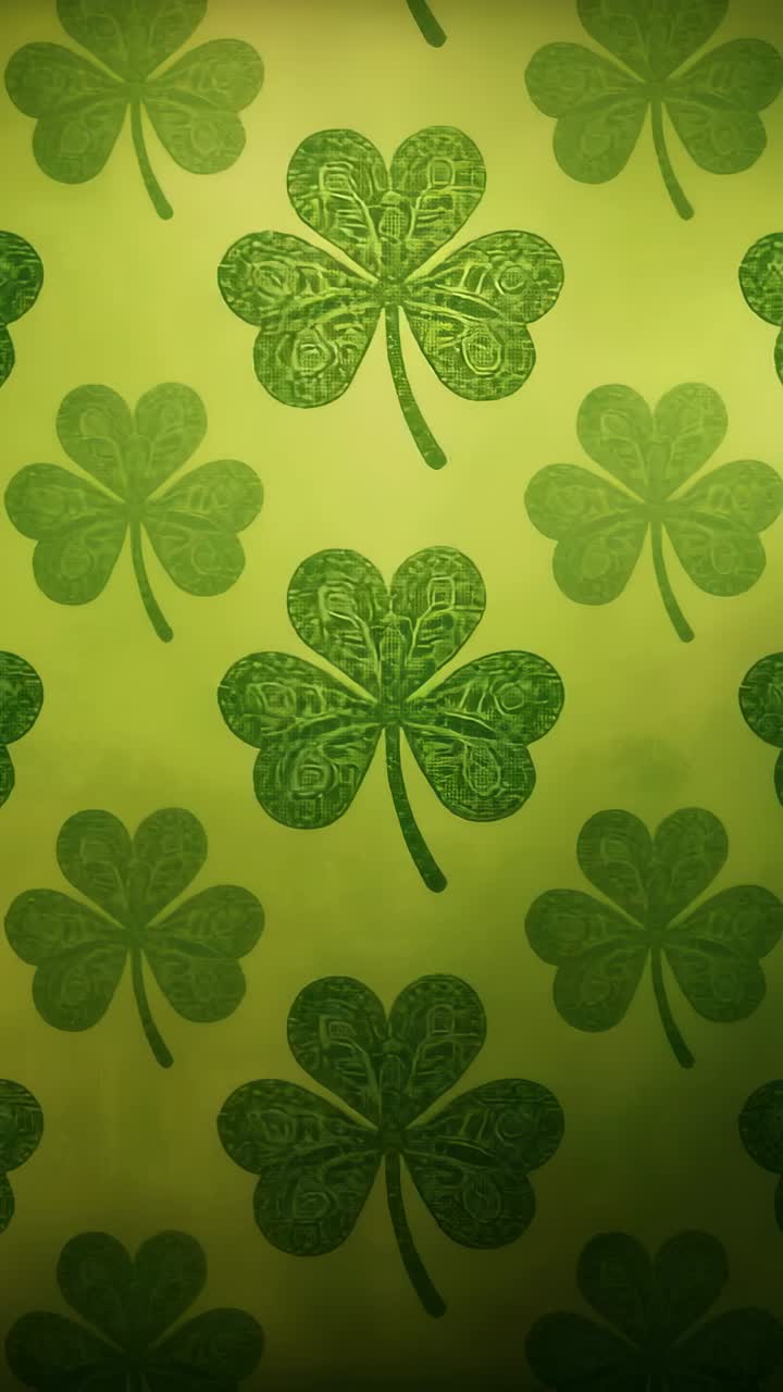 Vertical video: Panning camera moving surface upward in room, revealing four-leaf clover motif
