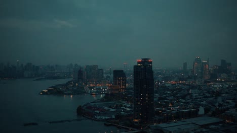 drone close skyscraper flyby in greenpoint broooklyn nyc towards long island city