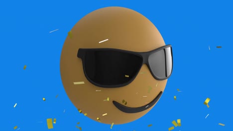 Digitale-Animation-Von-Goldenem-Konfetti,-Das-über-Das-Gesicht-Fällt-Und-Eine-Sonnenbrille-Trägt,-Emoji-Auf-Blauem-Hintergrund