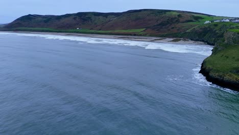 worms head outcrop at low tide at rhossili bay wales resembles a dragon head