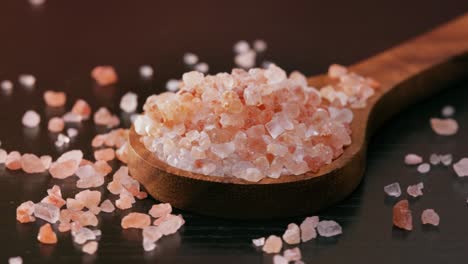 himalayan pink salt in a wooden is used to flavor food. due mainly to marketing costs, pink himalayan salt is up to twenty times more expensive than table or sea salt.