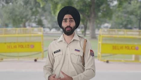 sikh indian police man talking