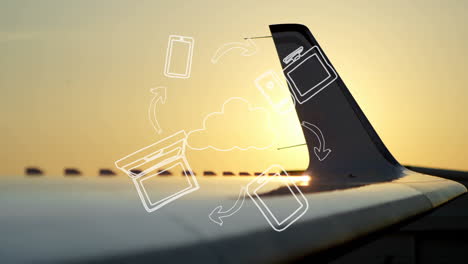 airplane wing with cloud computing icons during sunset, animation concept