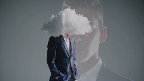 Surreal video concept of a man in a suit with a cloud for a head