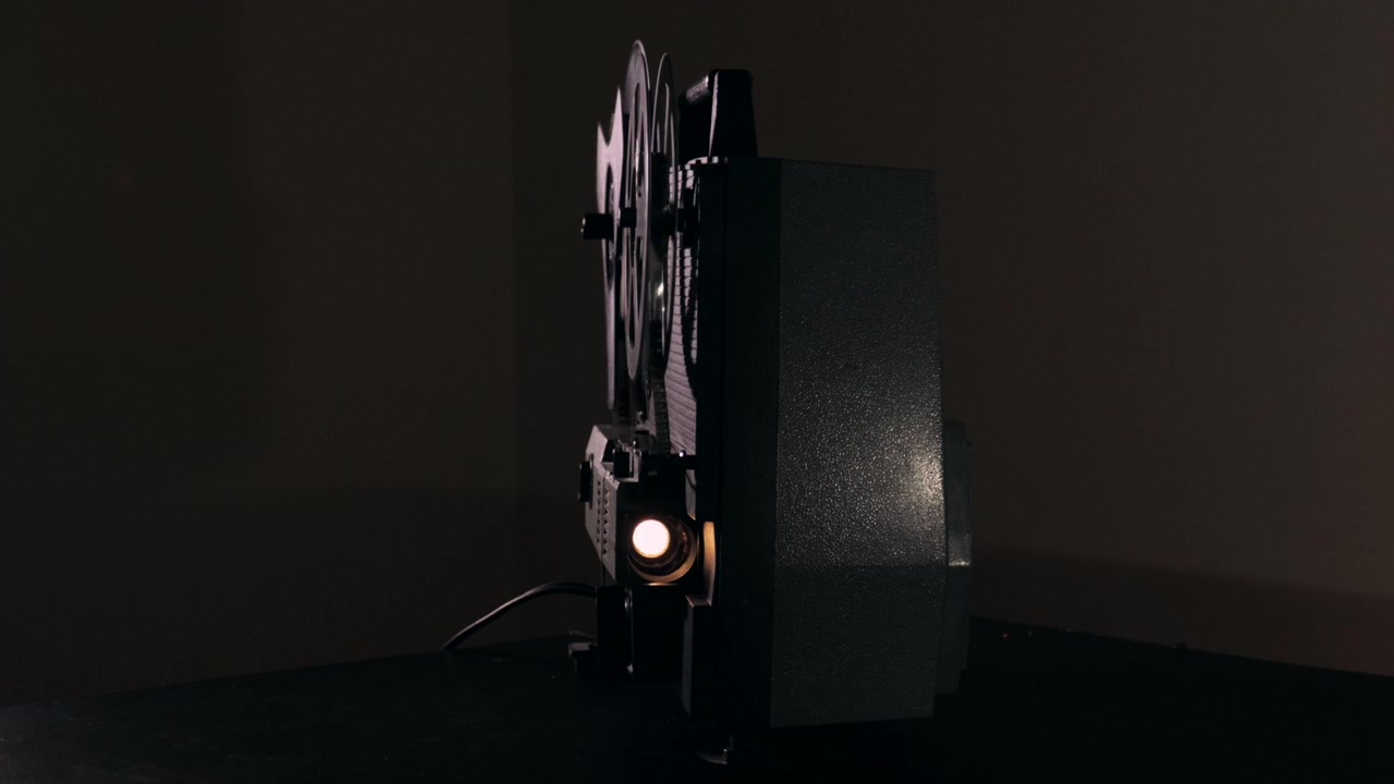 Vintage Super 8mm Projector in Dark Room