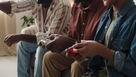 Boy-playing-video-games-with-family