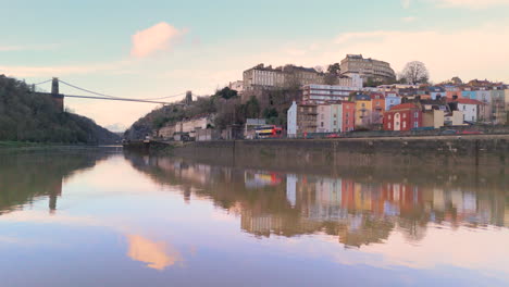 Reflection-in-River-Avon-of-Clifton-hillside-colorful-houses,-Hotwells