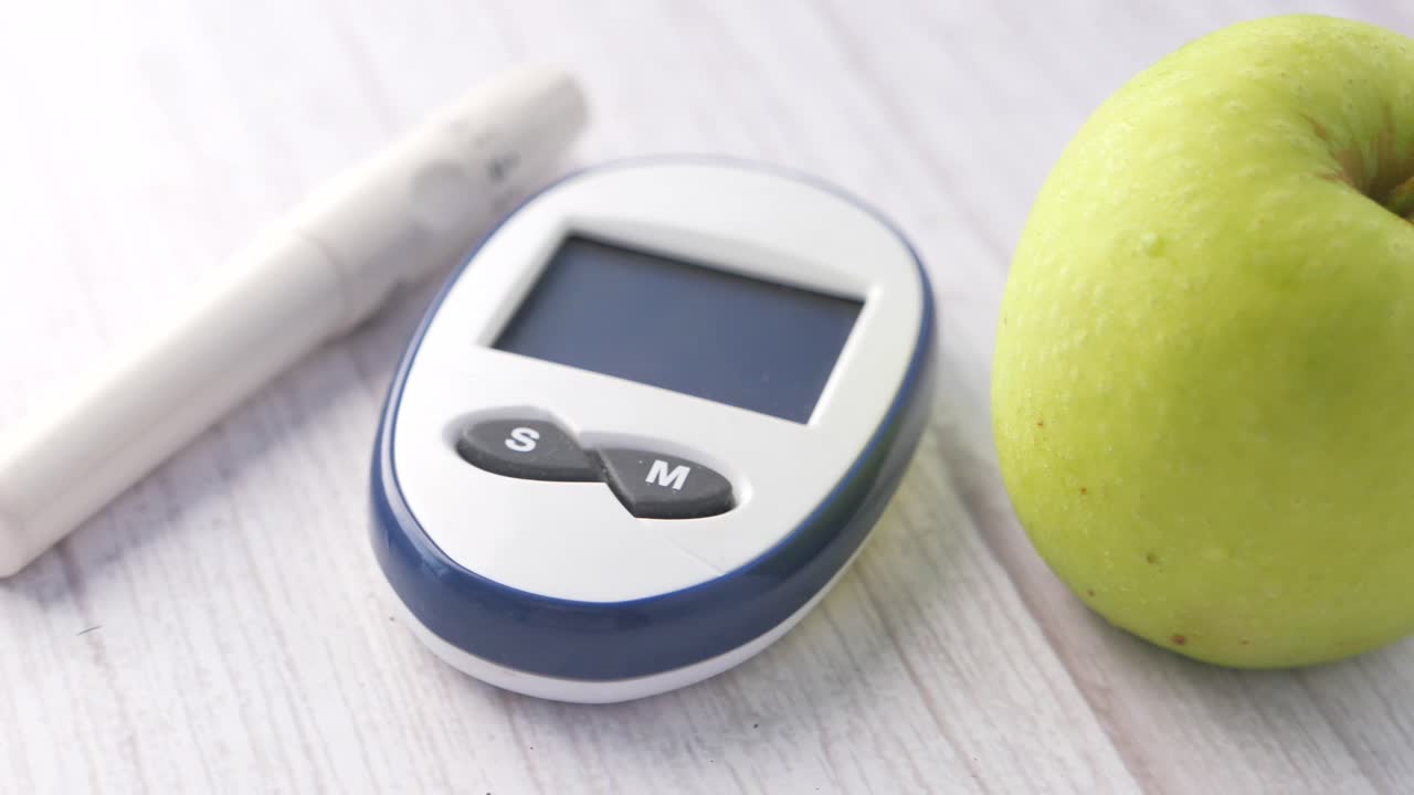 Blood Glucose Meter and Apple