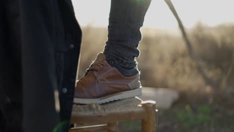 man's legs and shoes