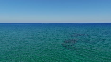 clear blue ocean and rocks
