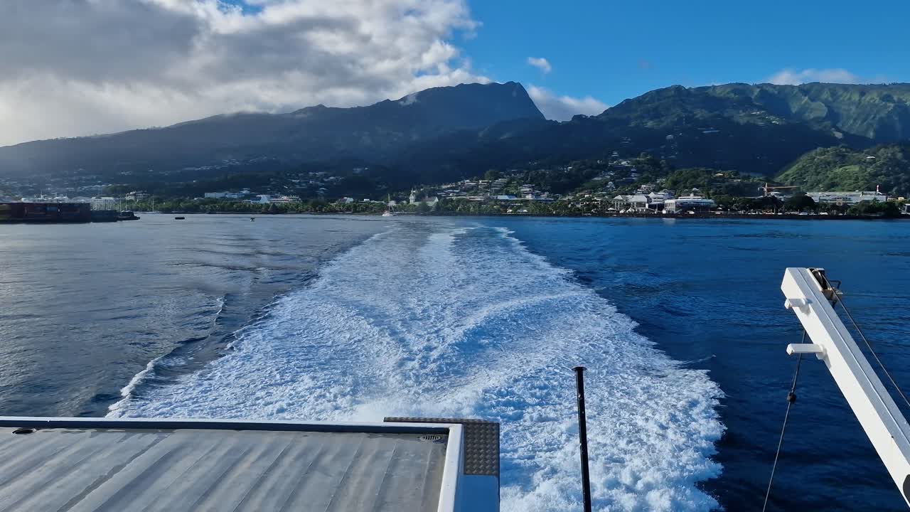 Papeete, Tahiti. French Polynesia. Wake of Ferry Boat Leaving City Harbor, Slow Motion