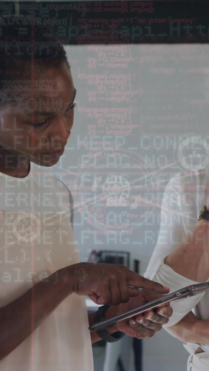 Animation of financial data and graphs over diverse female coworkers in office