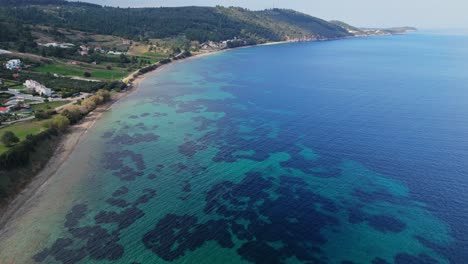 Aerial-view-of-the-amazing-Paliouri-Bay-in-Chalkidiki,-Greece