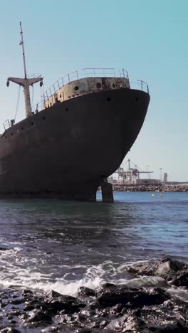 rusty shipwreck on the coast