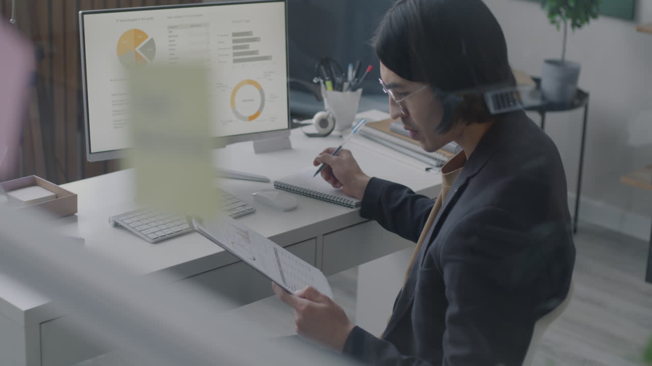 Business Professionals Working on Reports and Data Analysis