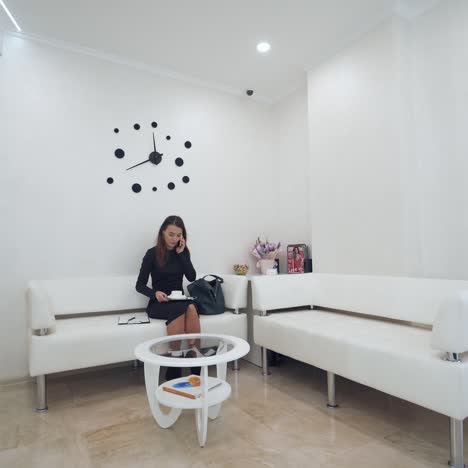 woman sitting in waiting room