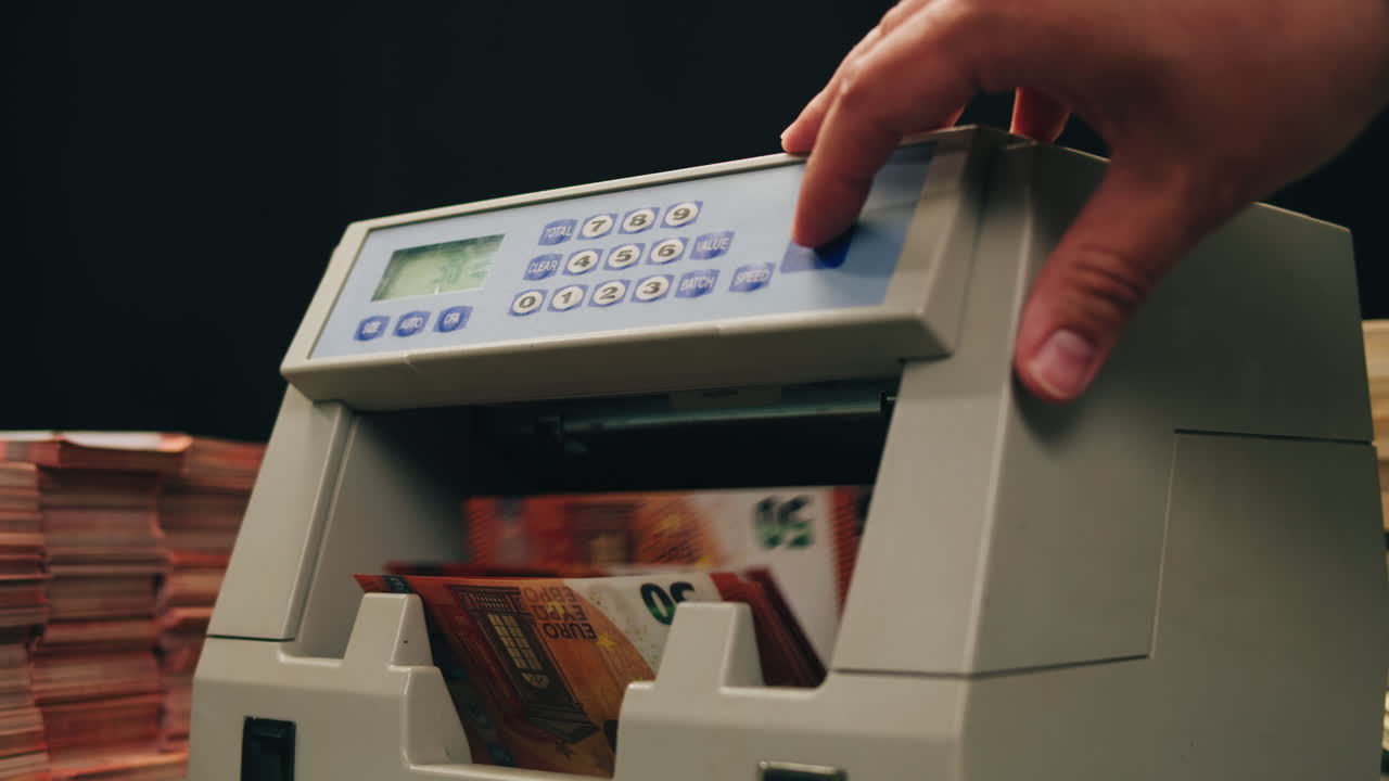 Specialised police officer Counting dollar banknotes in crime lab, conceptual image. High quality 4k footage