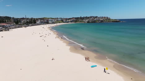 prominent bondi beach with watefront suburb in sydney, new south wales, australia