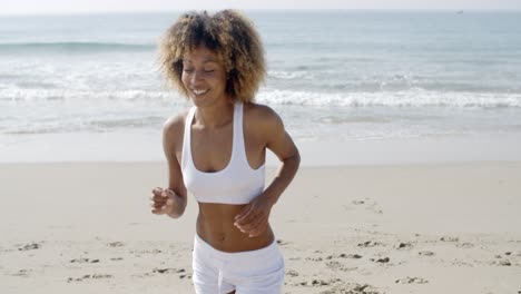 woman jogging on the beach