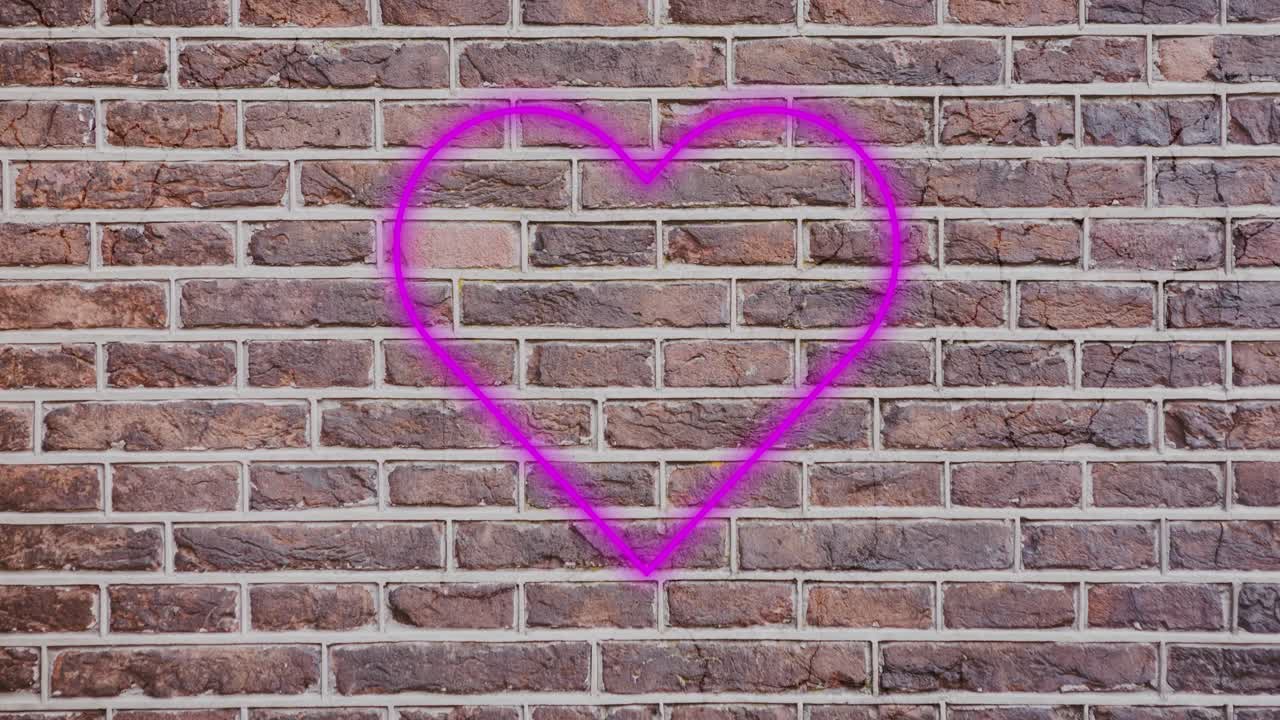 벽돌 벽에 네온 심장 표지판 4k
