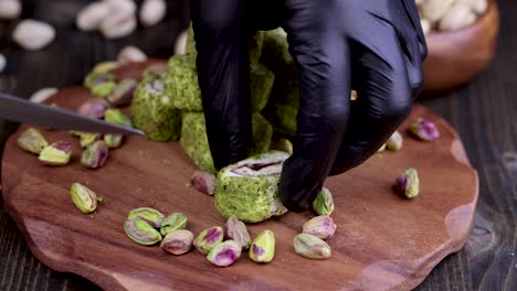 fresh turkish delight with green pistachios cut with a knife