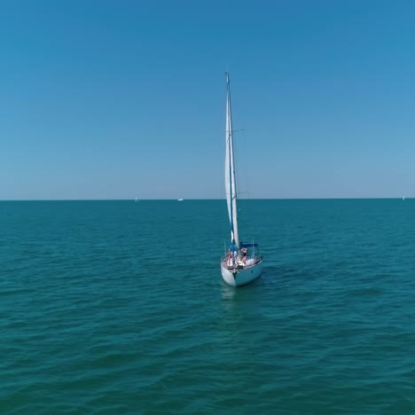 sailing ship in beautiful sea. aerial drone view of sailboat in windy condition