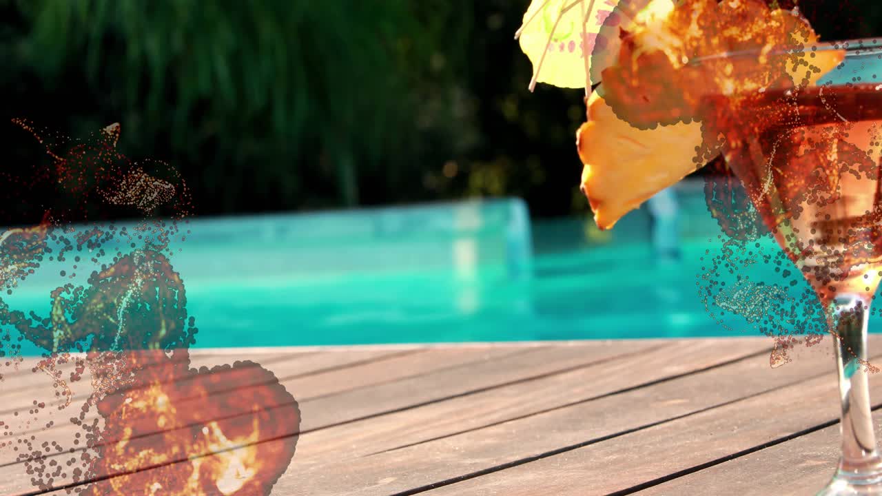 Rising particles swirling near cocktail glass revealing woman surfacing pool for beverage marketing