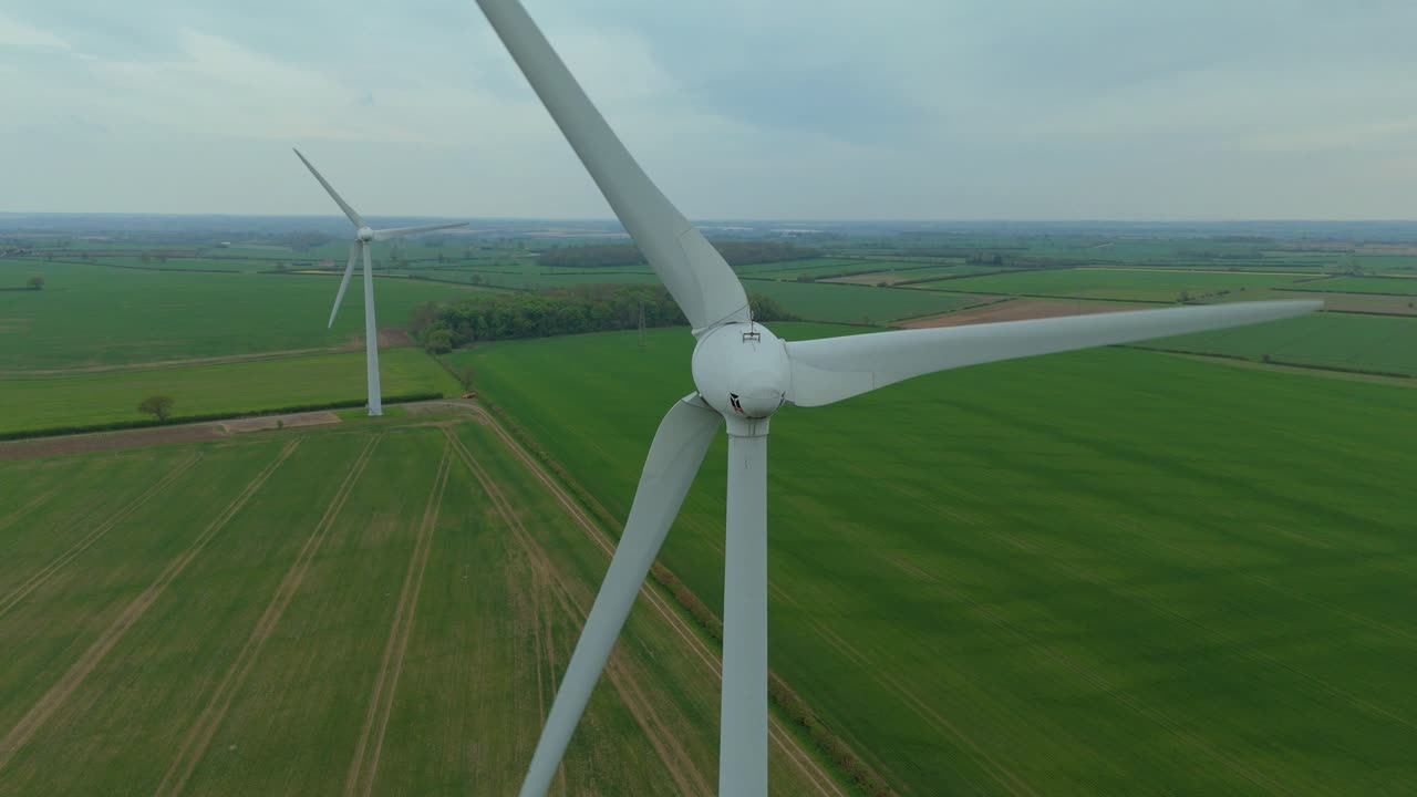 Aerial View of Wind Turbines and Fossil Fuel Transition in Roade