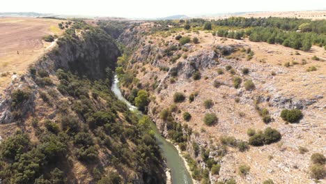 faraggi aggiti, serres greece, agitis canyon gorge with river aerial panning shot