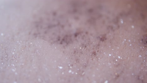 close up view of foam and soapy bubbles on a moving water surface, self care, bathtub, background