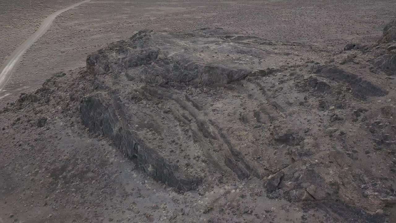 4k Aerial Drone Shot Next to Desolate Desert Mountains