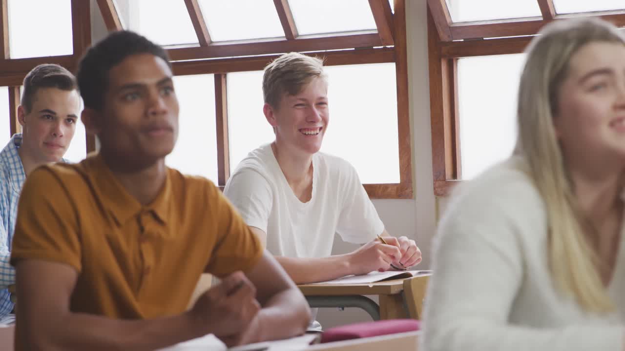 Student smiling in high school class