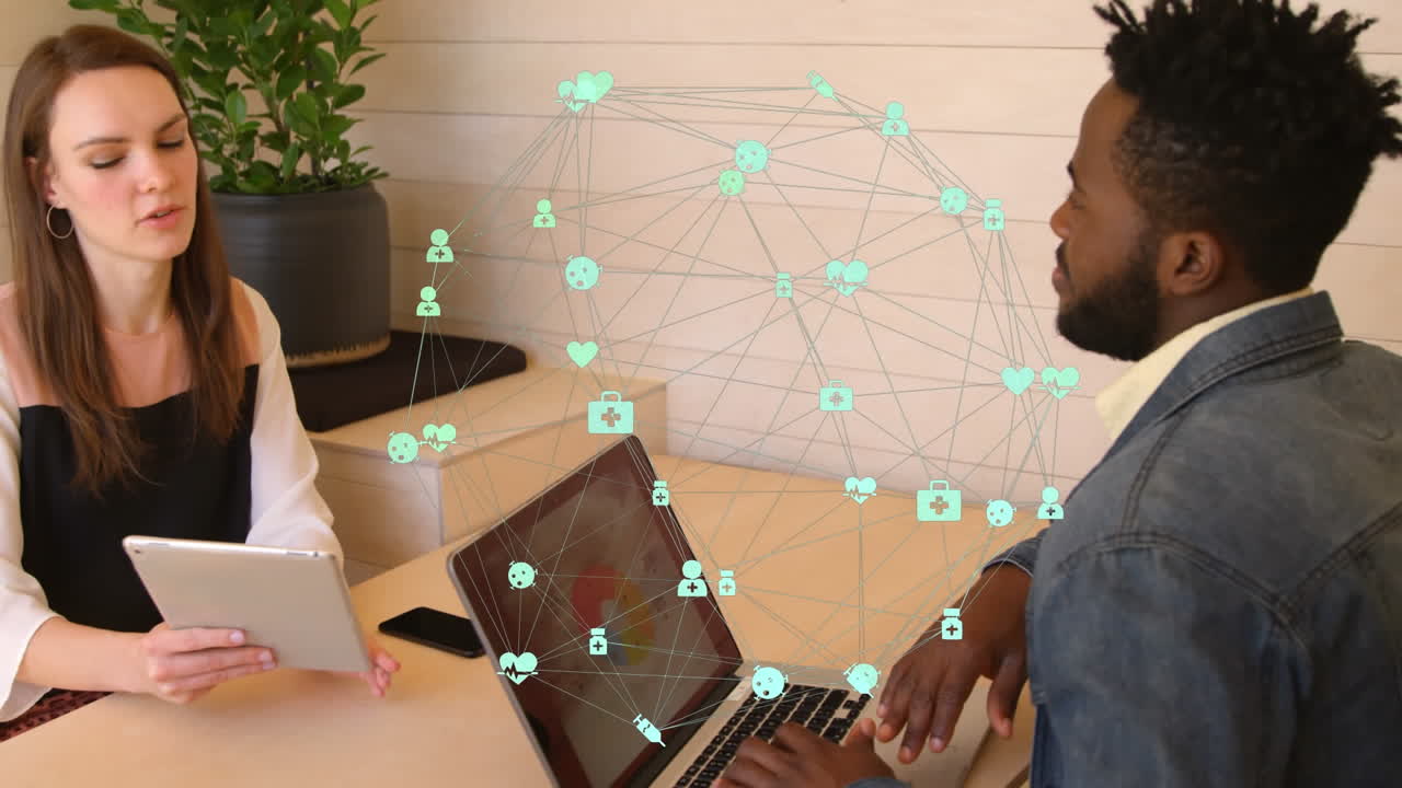 Animation of globe with network of connections and icons over diverse business people in office