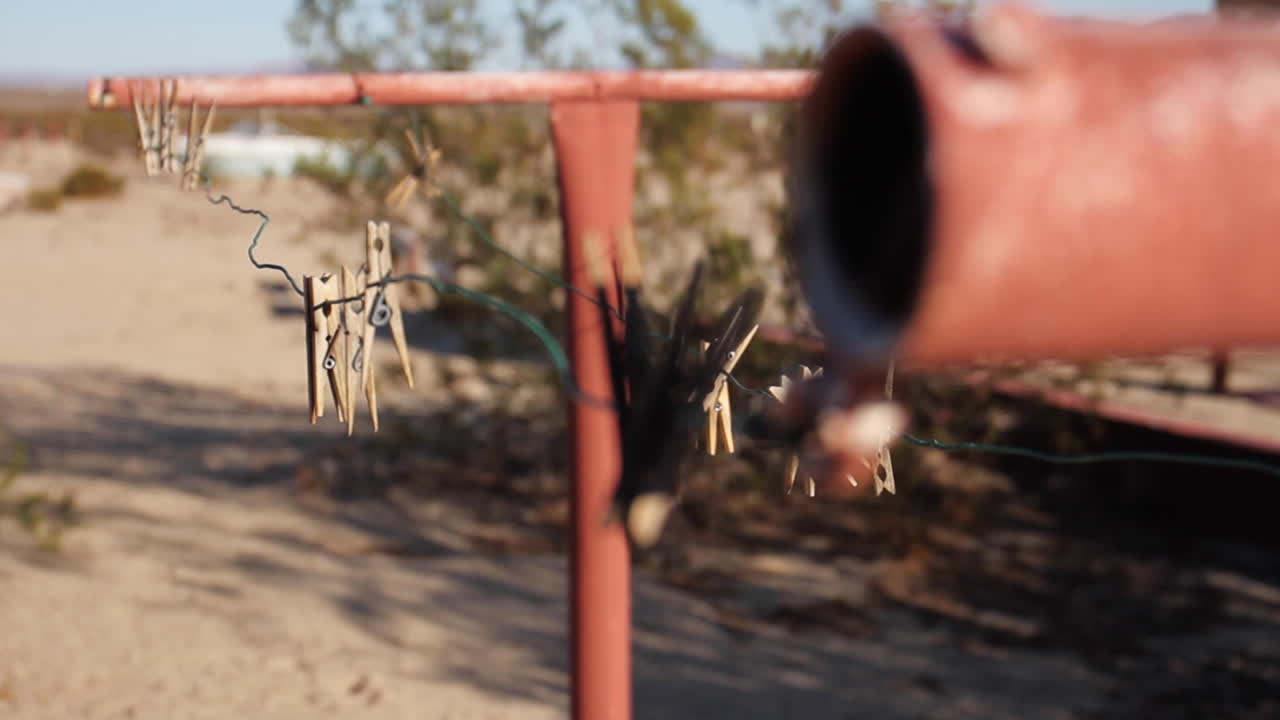 Clothespins on a clothesline in the desert