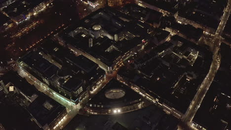 AERIAL:-Slow-Shot-of-City-at-Night,-Cologne,-Germany