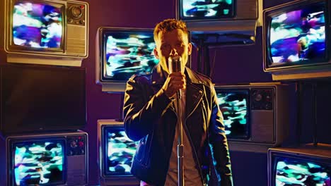 man singing into microphone in retro tv room