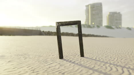 mysterious doorway stands alone on sandy beach during sunset