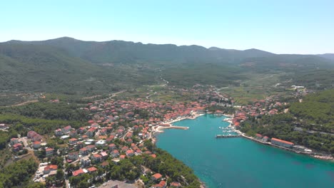 jelsa town on island hvar in croatia, aerial drone midday establishing