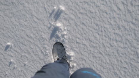 Person-trudging-through-the-snow-in-slow-motion