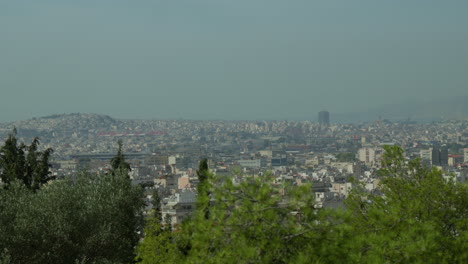 Expansive-view-of-Athens-sprawling-under-the-midday-haze
