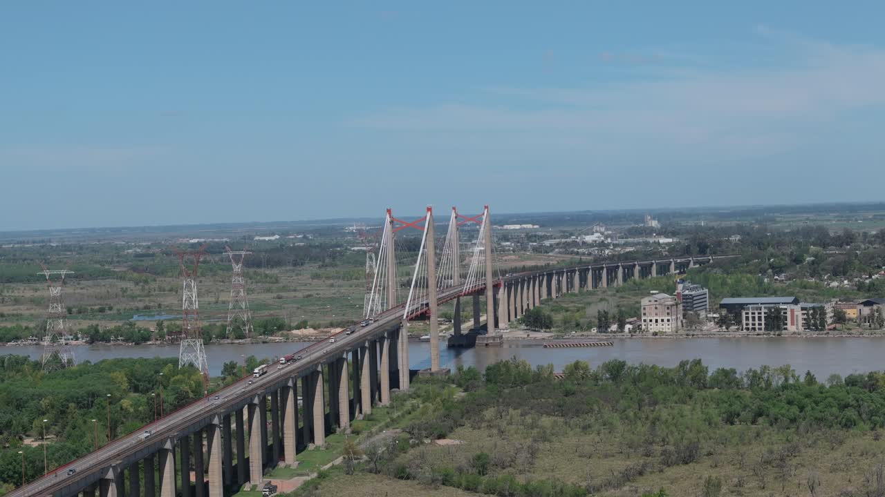 Aerial view of structure of cable-stayed bridge over Paraná River. Entre Ríos Province, Argentina. 4k.