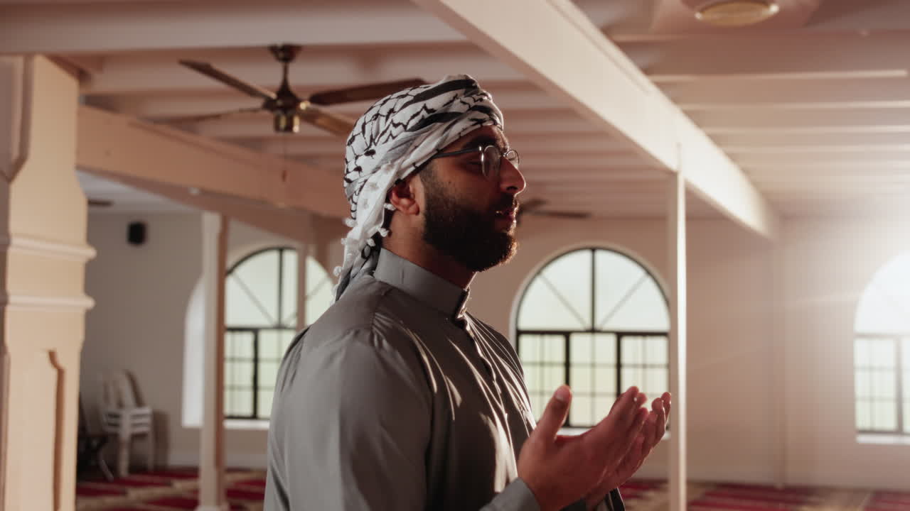 Muslim man praying in a mosque