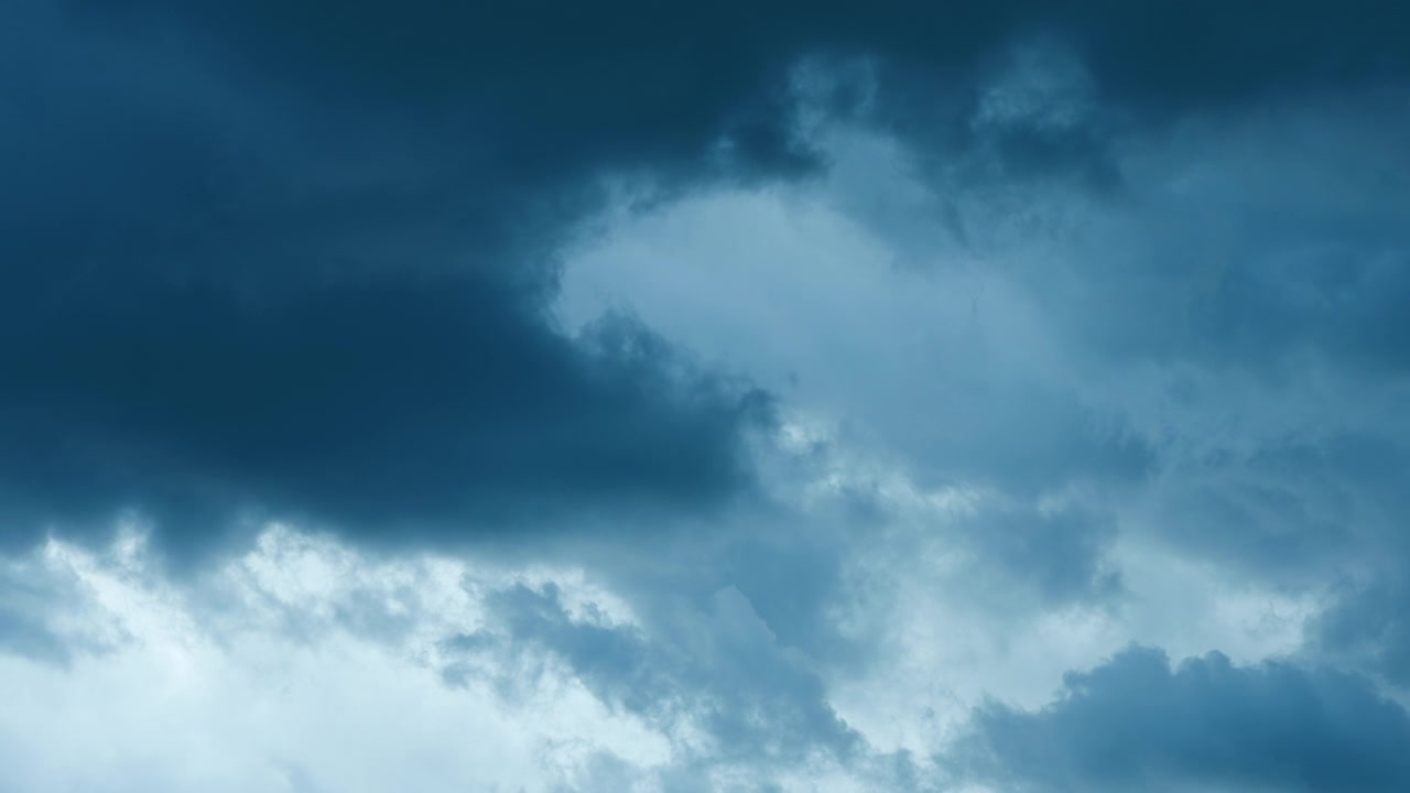 Gentle blue clouds seamless loop for relaxing motion background