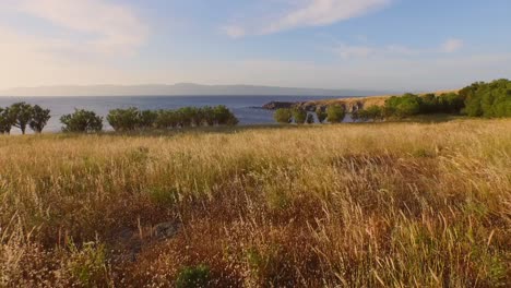 aerial: sunset at the cliffs of molyvos, lesbos